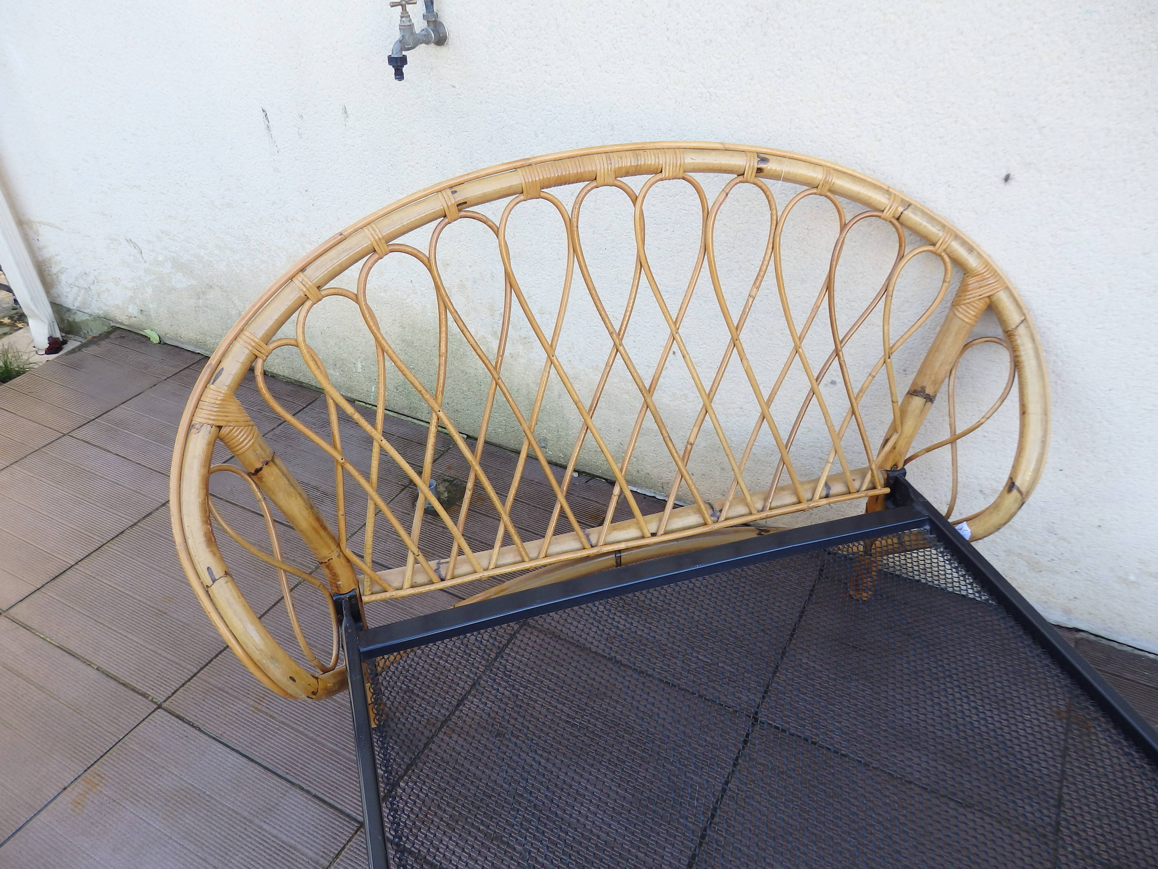 Vintage single bed in rattan
