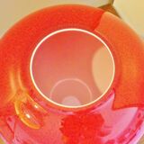 Pot-bellied, art deco vase in speckled ruby red multi-layered glass, white interior