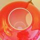 Pot-bellied, art deco vase in speckled ruby red multi-layered glass, white interior