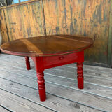 Oval coffee table in wood and red