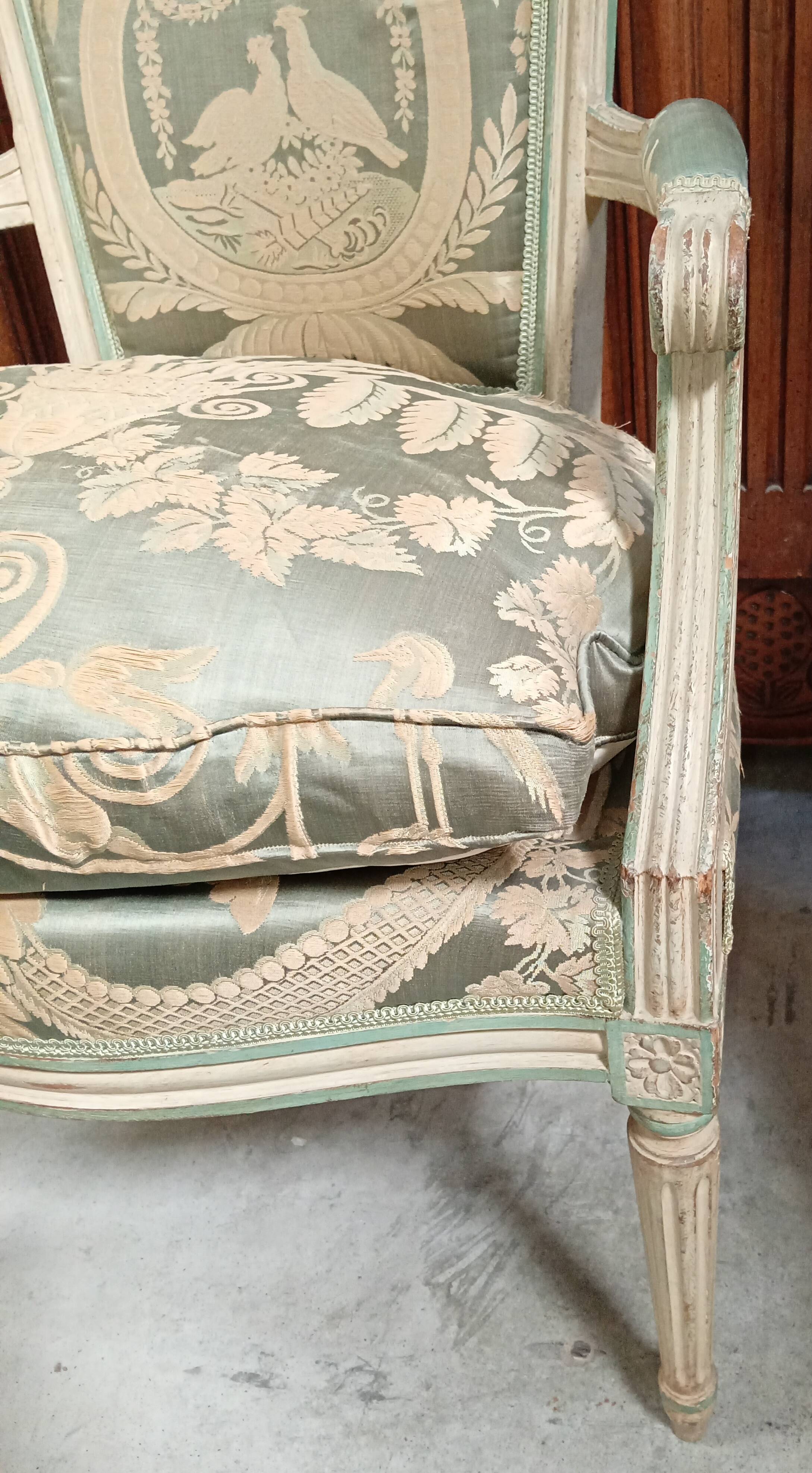Pair of large Louis XVI armchairs in water green and cream wood.