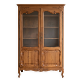 Antique display cabinet in Louis XV style made of wood.