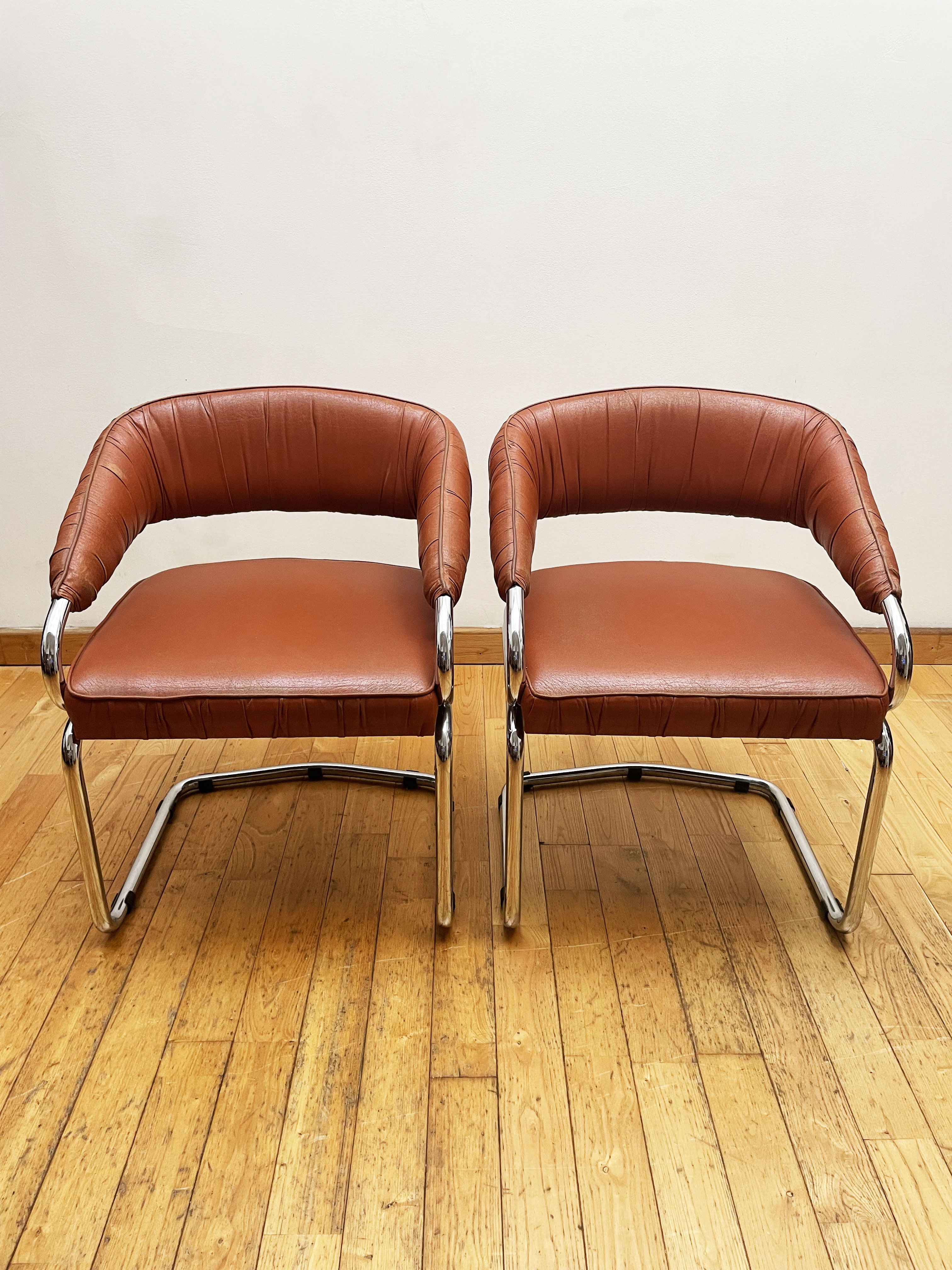 Pair of leather armchairs year 70