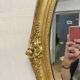 Miroir oval en bois doré 70x49cm