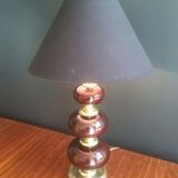 Lamp made of brass and red colored glass