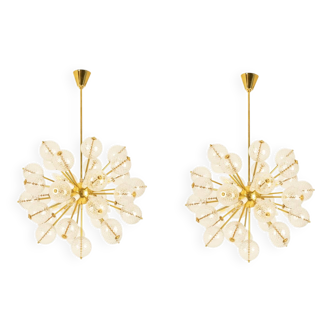 Kamenický Šenov, published by. Pair of brass and glass chandeliers. Around 1970.