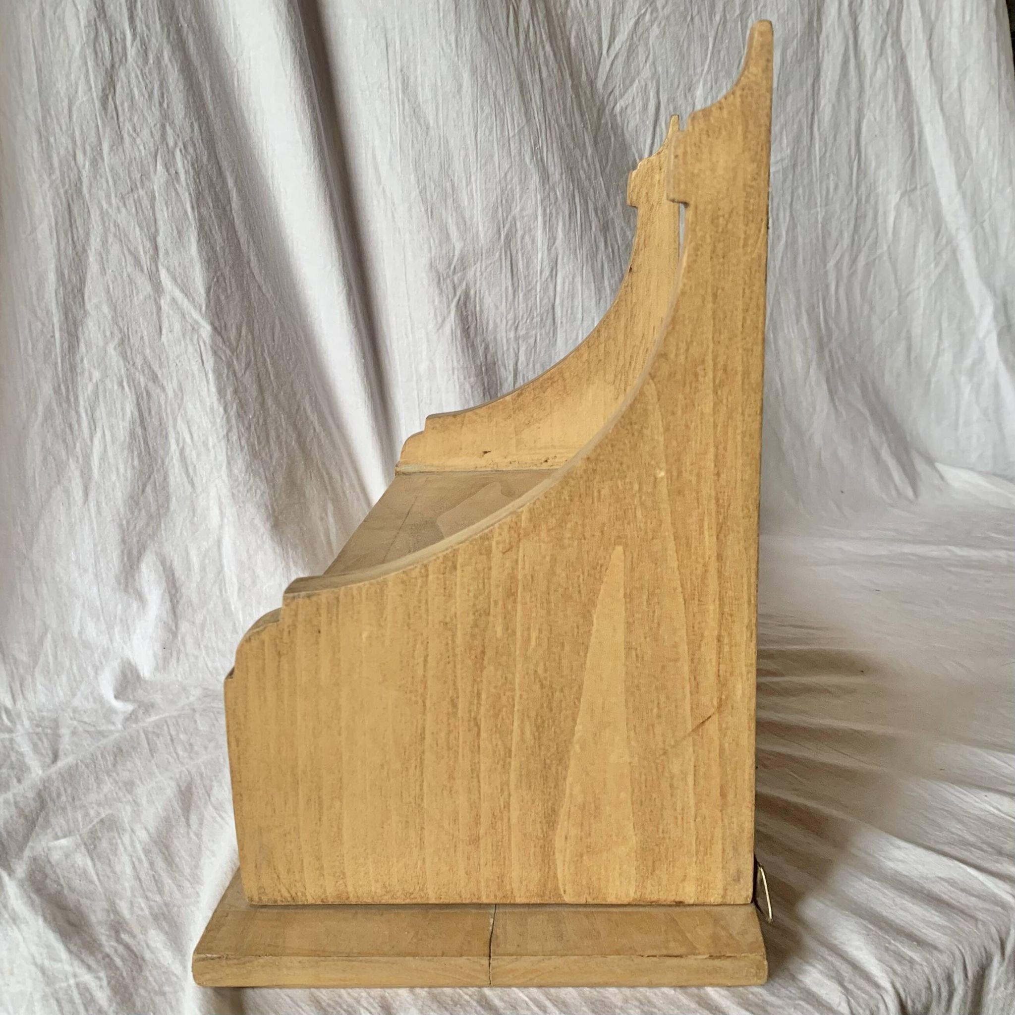 Old small hanging shelf in solid wood