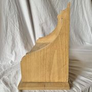 Old small hanging shelf in solid wood