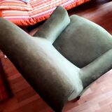 Old green velvet armchair