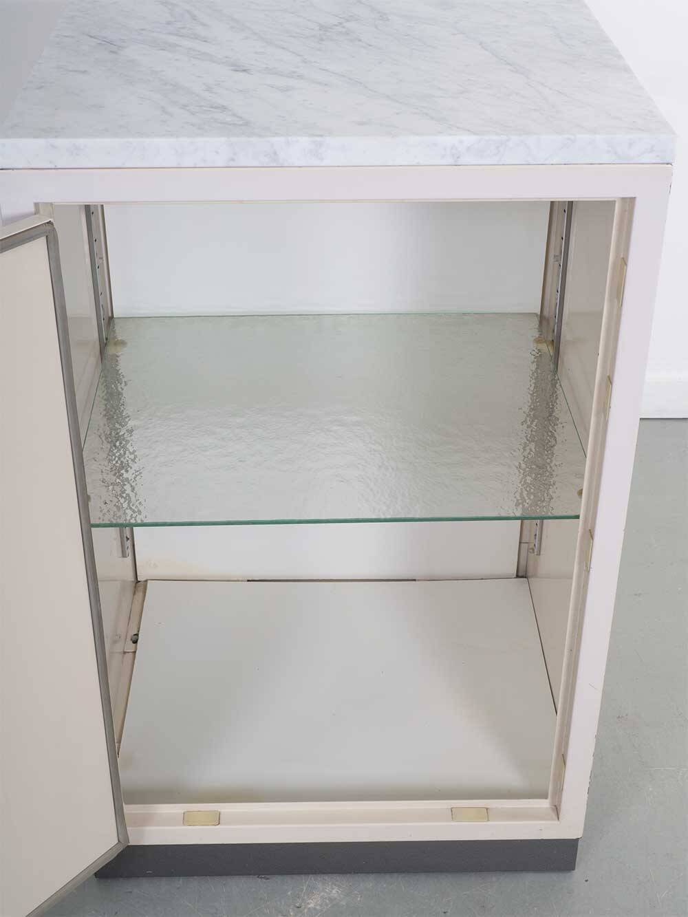Set industrial cabinets with marble top.