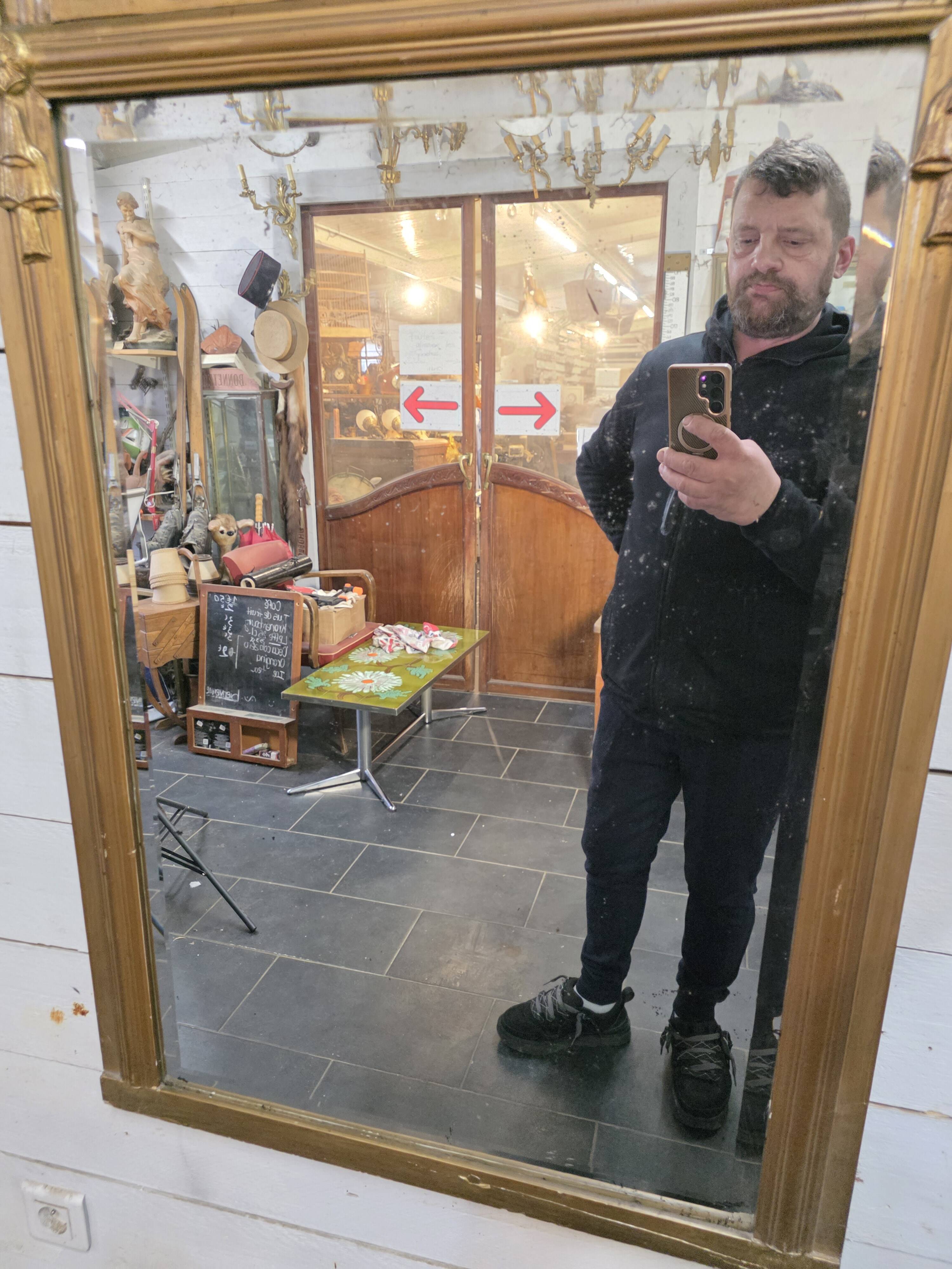 Art Deco gilded trumeau, bevelled mirror