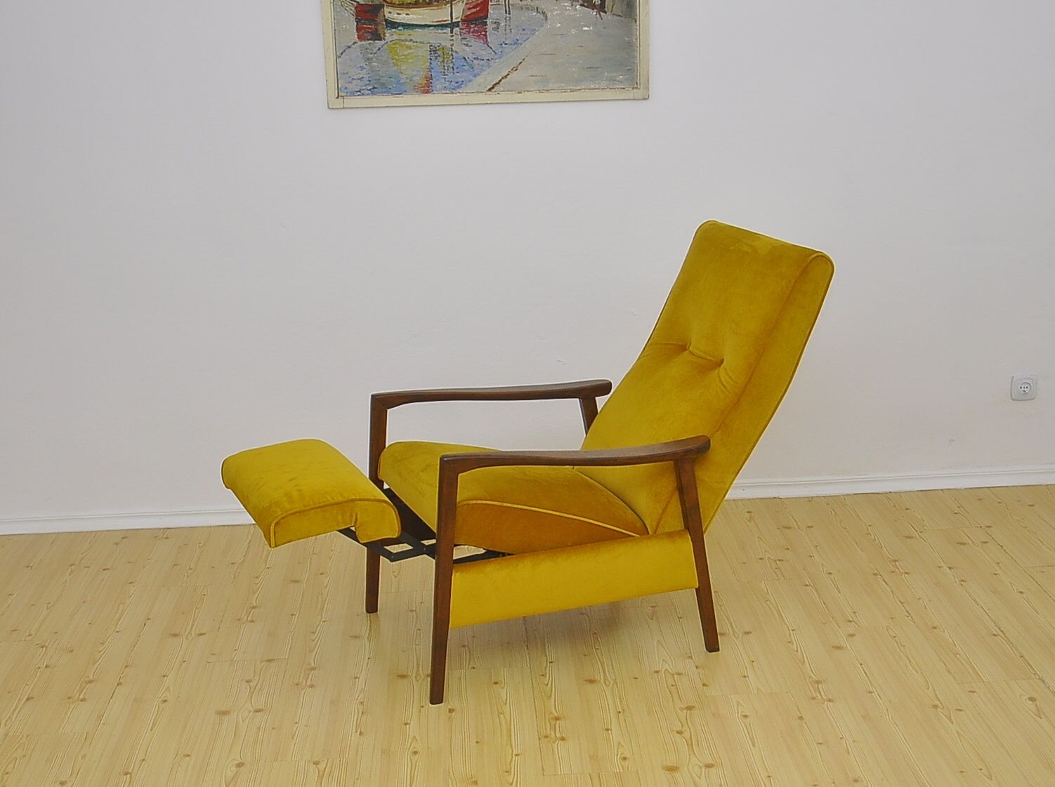 Mid-century armchair with folding footrest, 1960s