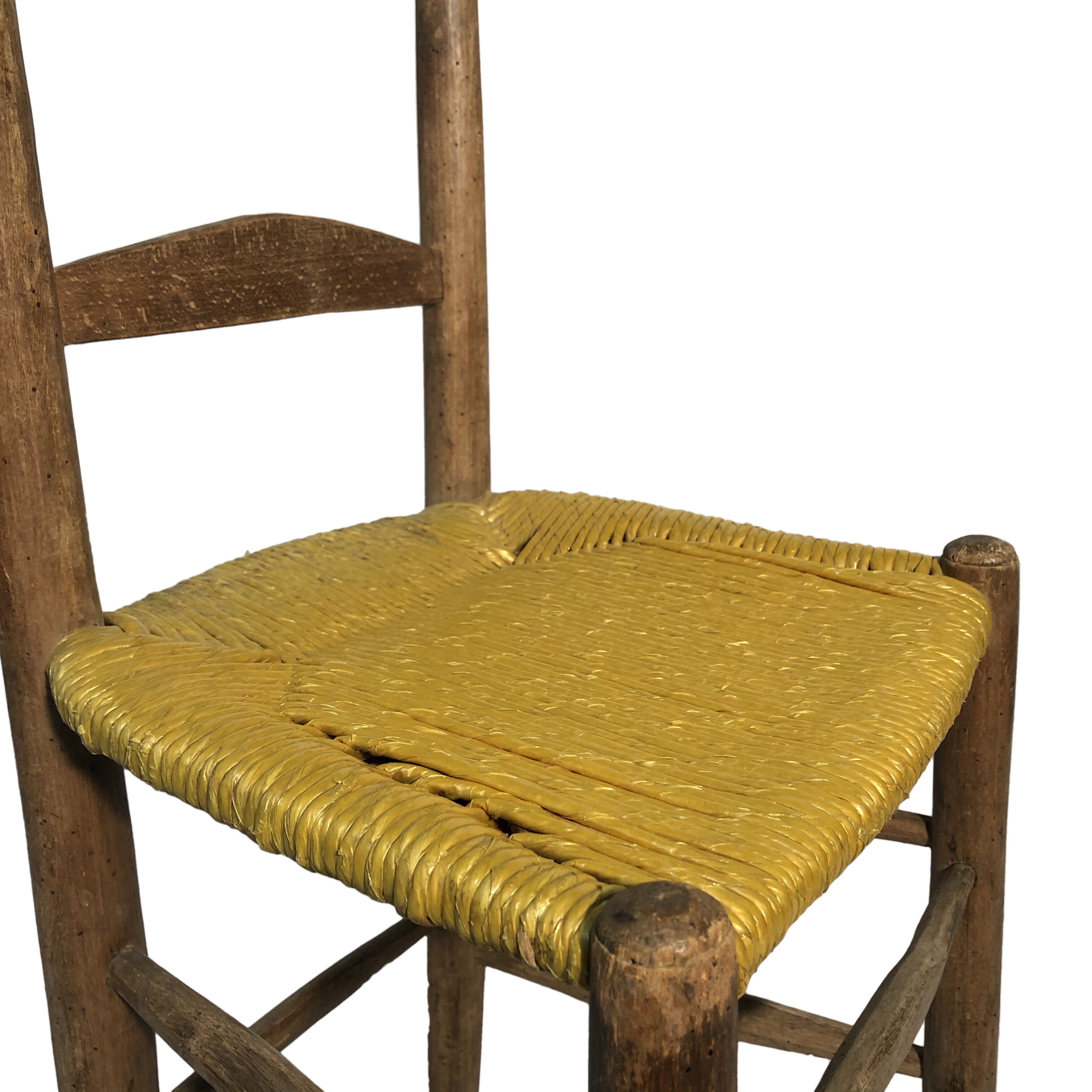 Old wooden chair, mulched seat
