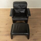 1980s cor armchair and ottoman in black leather