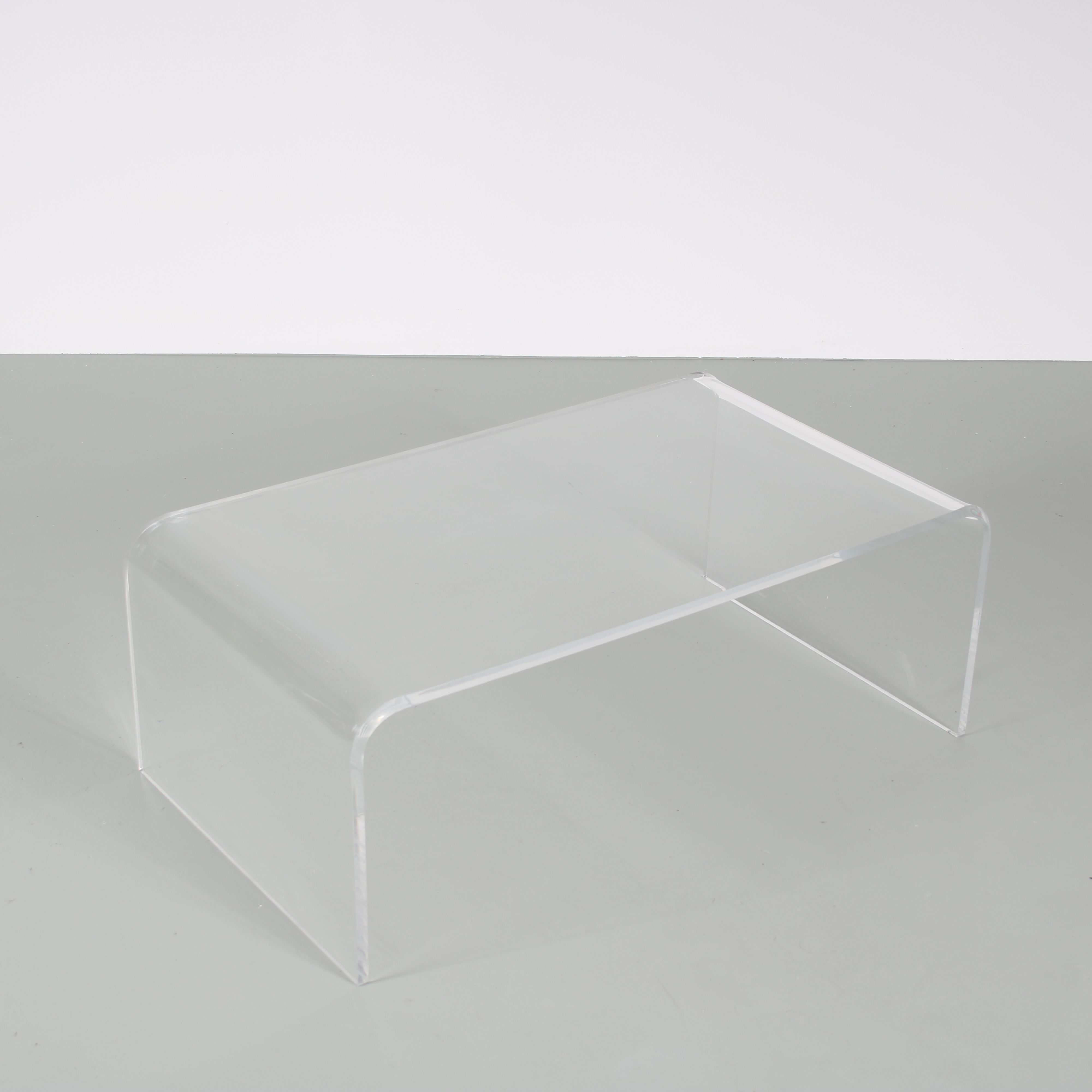 1970s Bent plexiglass coffee table from France