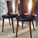 Pair of Dove chairs • Baumann • Black faux leather