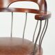 Swivel side chair / office chair with a cognac-coloured cow leather seat