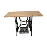 Living room console with sewing machine foot