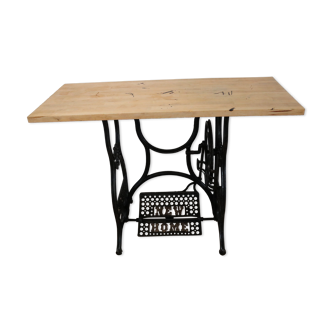 Living room console with sewing machine foot