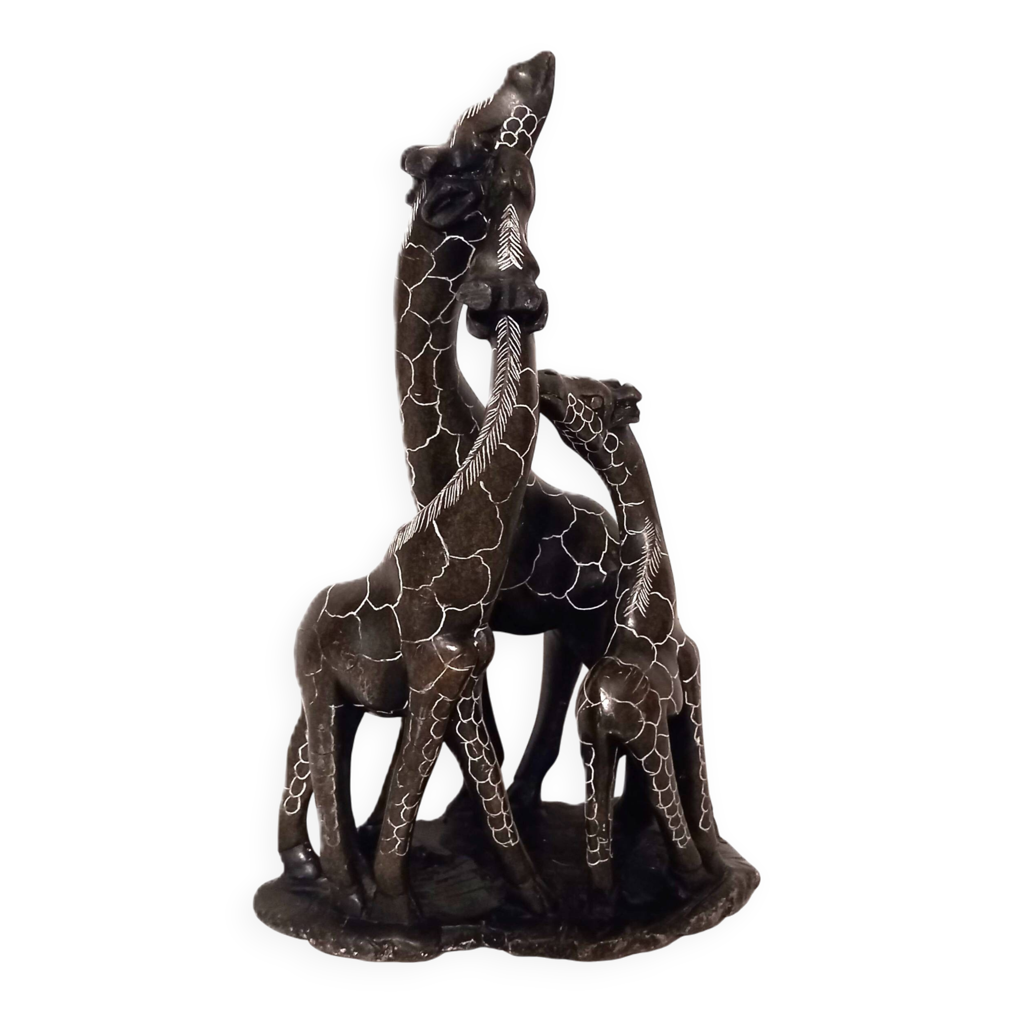 African stone sculpture of 3 Giraffes