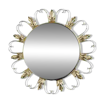 Miroir rond sur cadre laiton à volutes