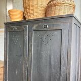 Old wooden locker with black patina