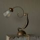 Sculptural table lamp in brass and opaline glass, early 20th century.