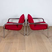 Pair of Italian armchairs in chromed metal and red fabric, 1970