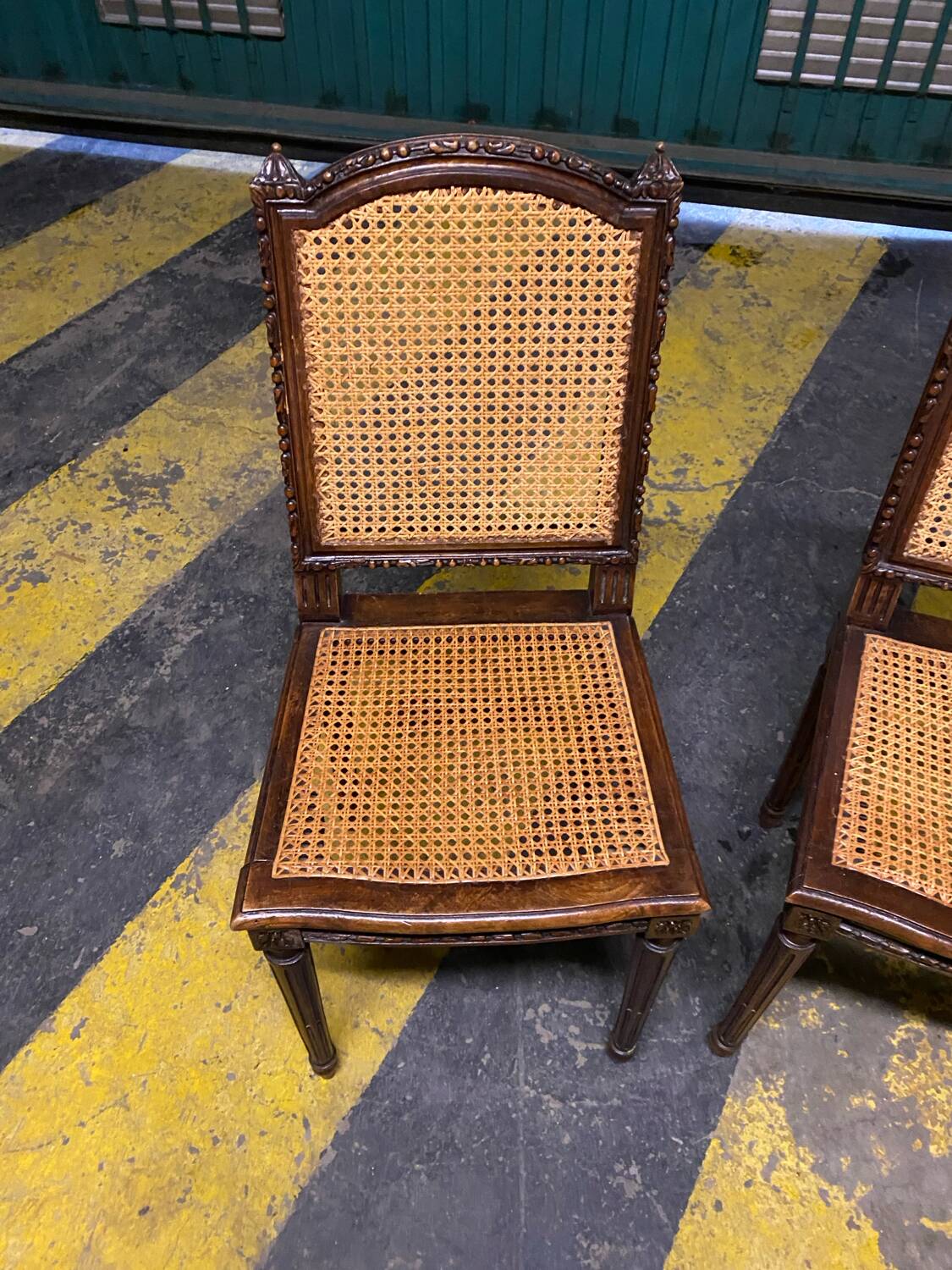 Louis XVI style caned chairs