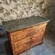 French antique walnut commode with a dark grey marble top, circa 1830–1860.