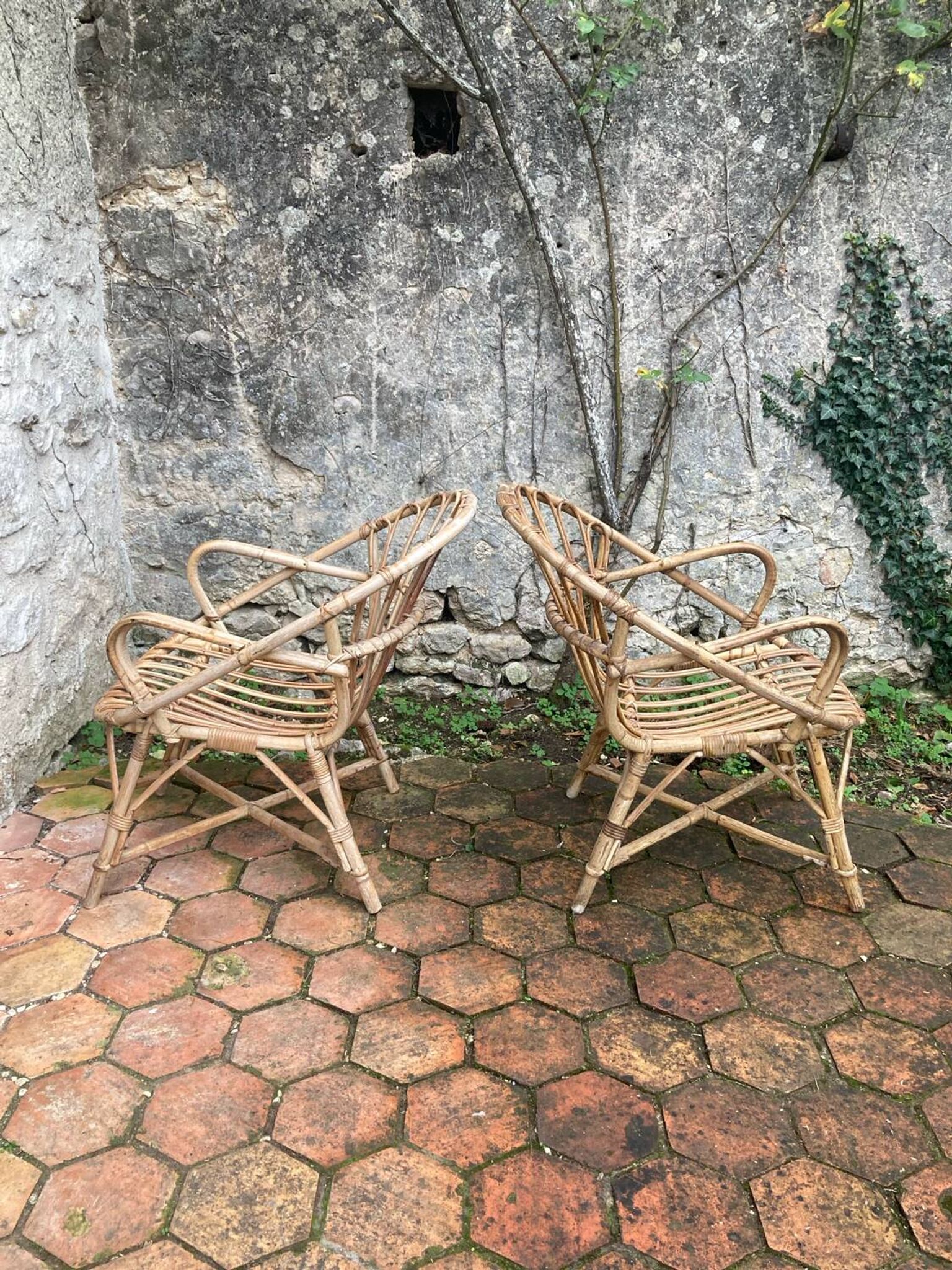 Pair of vintage rattan armchairs