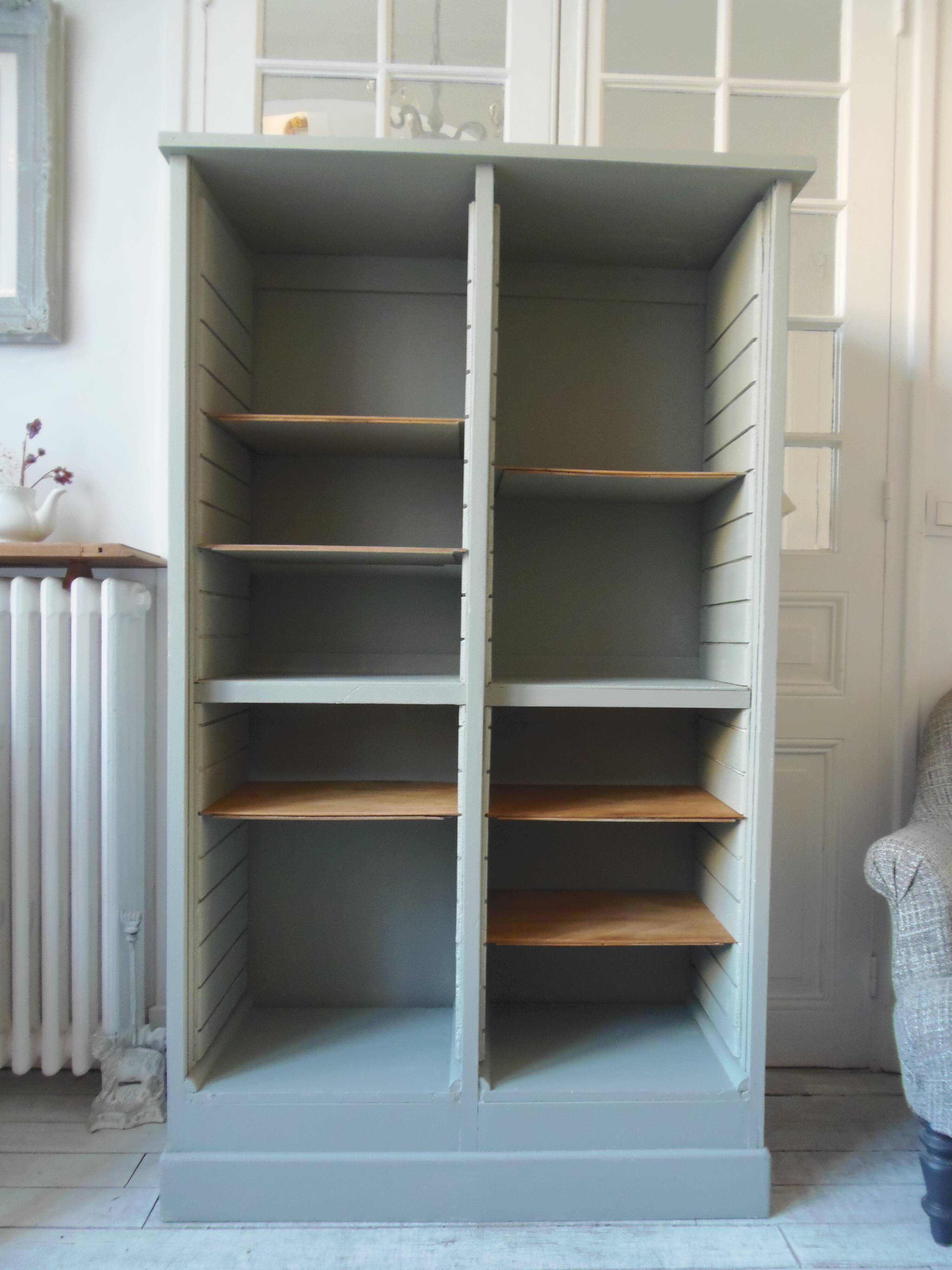 Vintage furniture transformed into a bookcase, verdigris patinated sideboard.