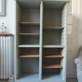 Vintage furniture transformed into a bookcase, verdigris patinated sideboard.