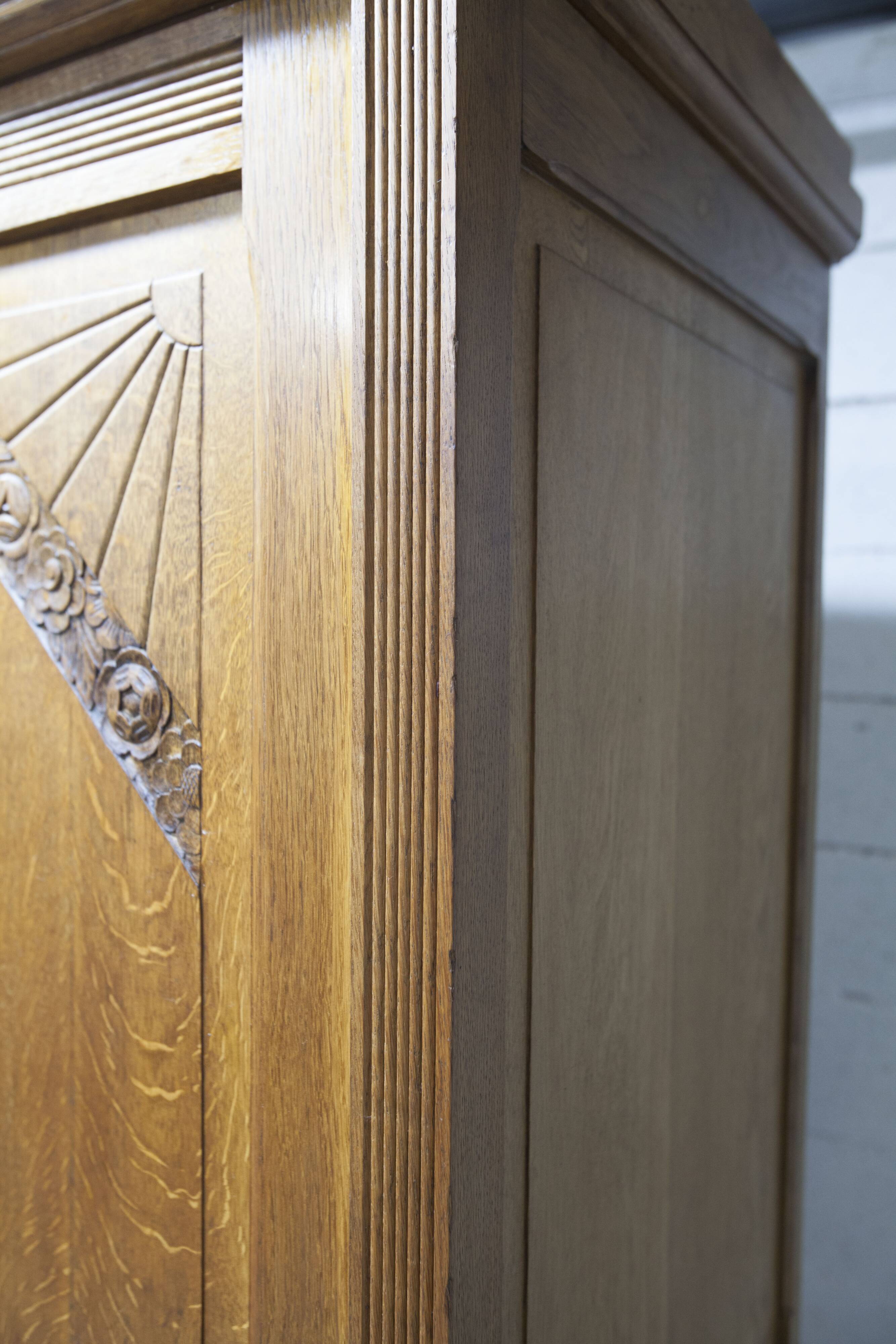 Art Deco carved oak wardrobe - Flemish workshop circa 1930