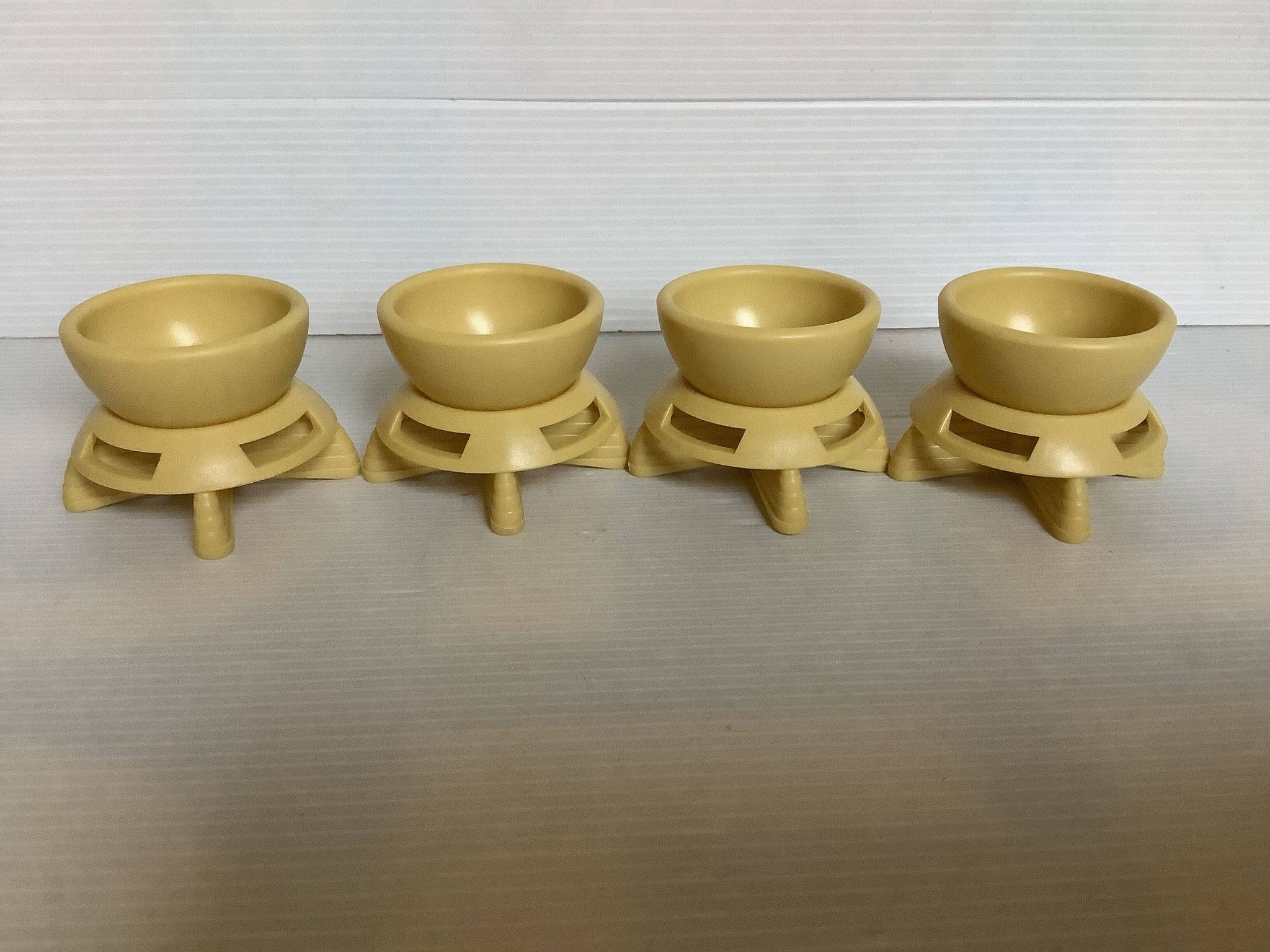 Quatre coquetiers rotatifs