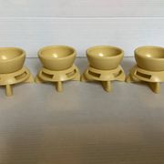 Quatre coquetiers rotatifs