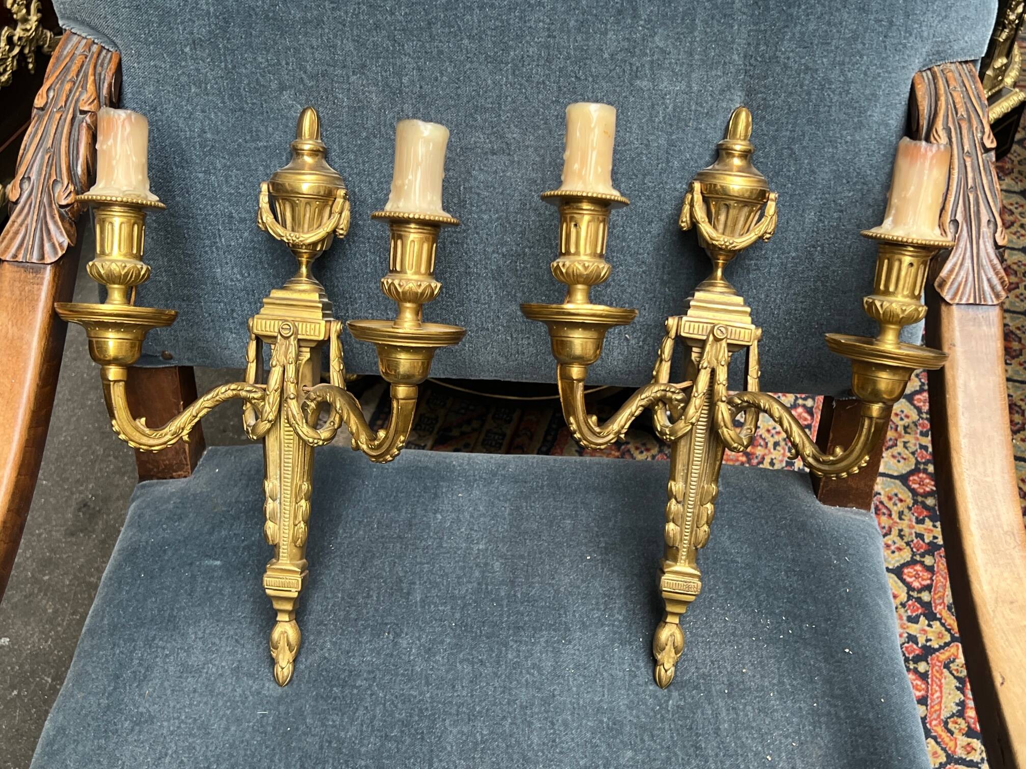 Pair of wall lights. Solid gilded bronze.