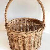 Basket with vintage rattan bottles