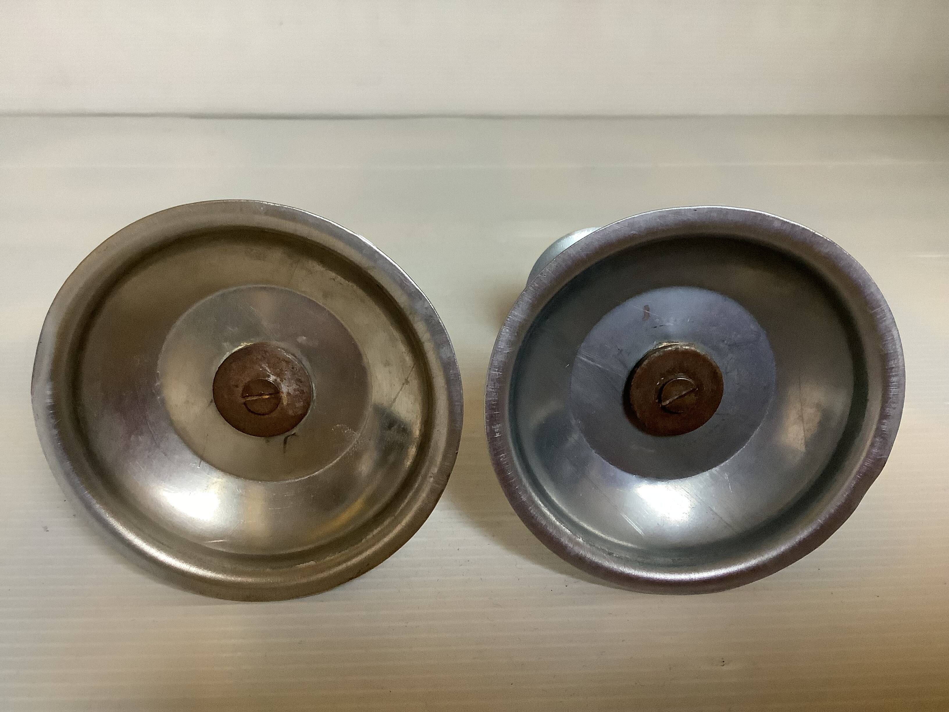 Pair of small silver metal candlesticks