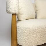 “Bean” shaped 3-seater sofa, in blond beech. Contemporary work