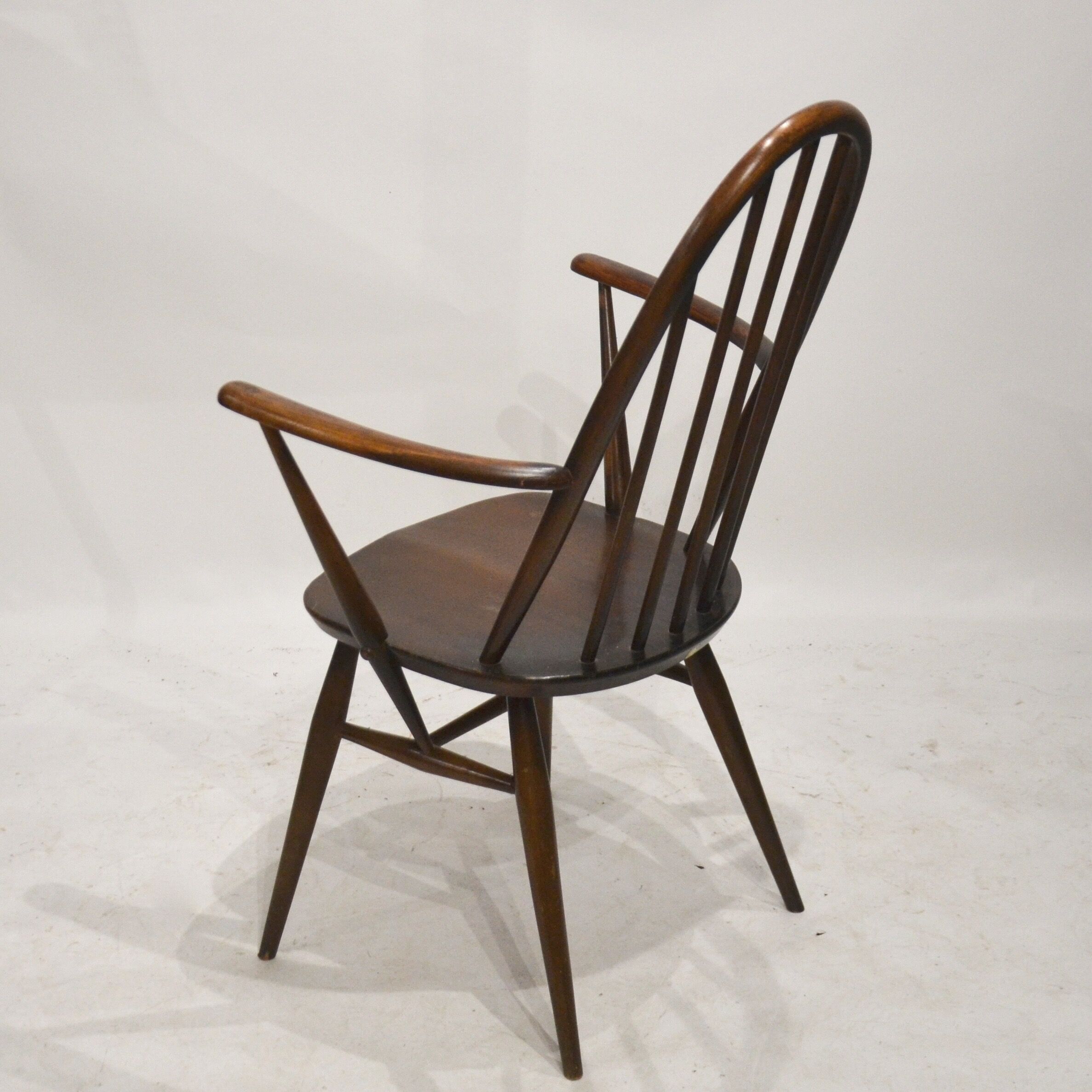 Pair of Ercol chairs with armrests