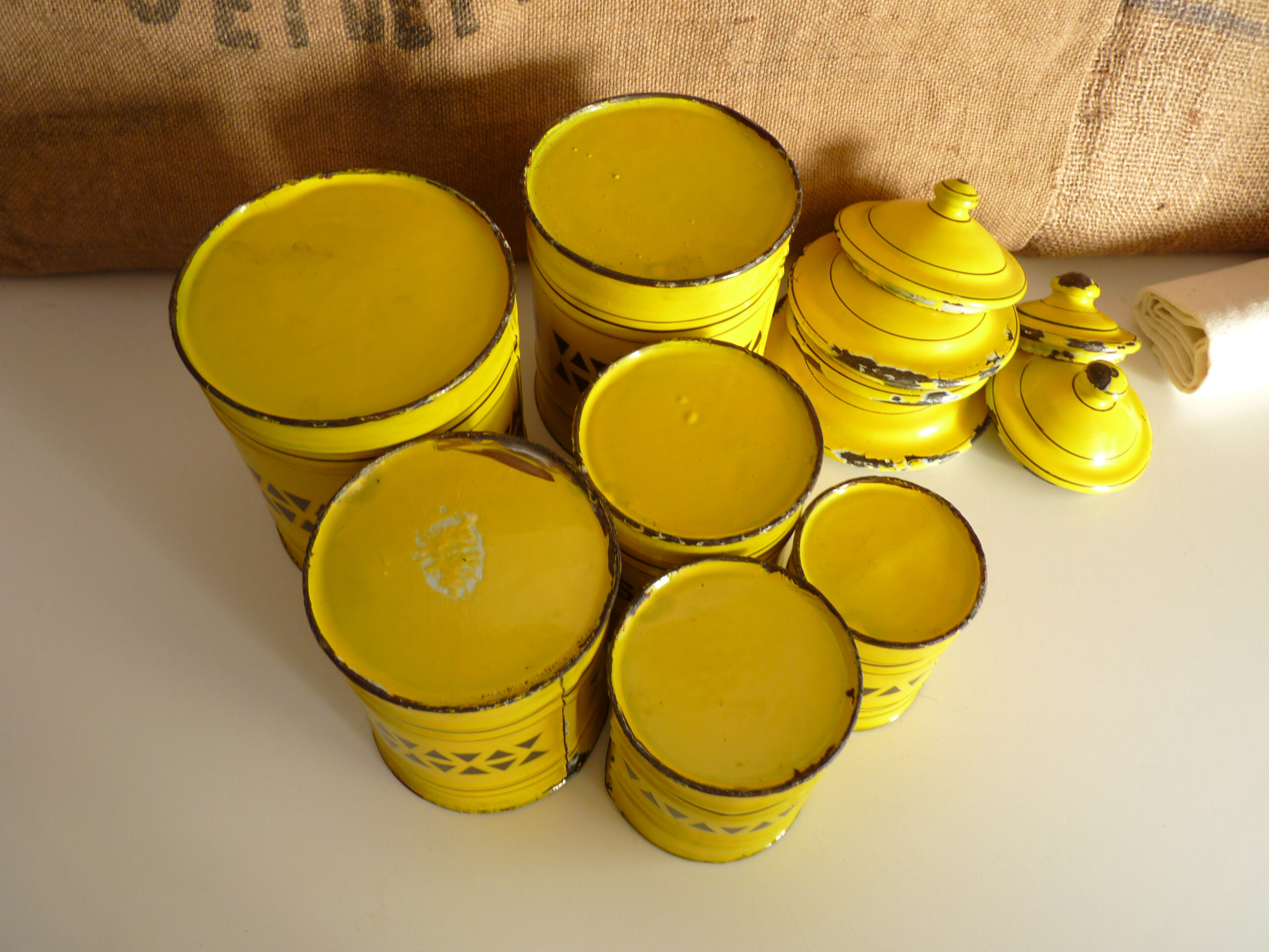 6 spice jars yellow and black enamelled sheet metal, fireplace pot