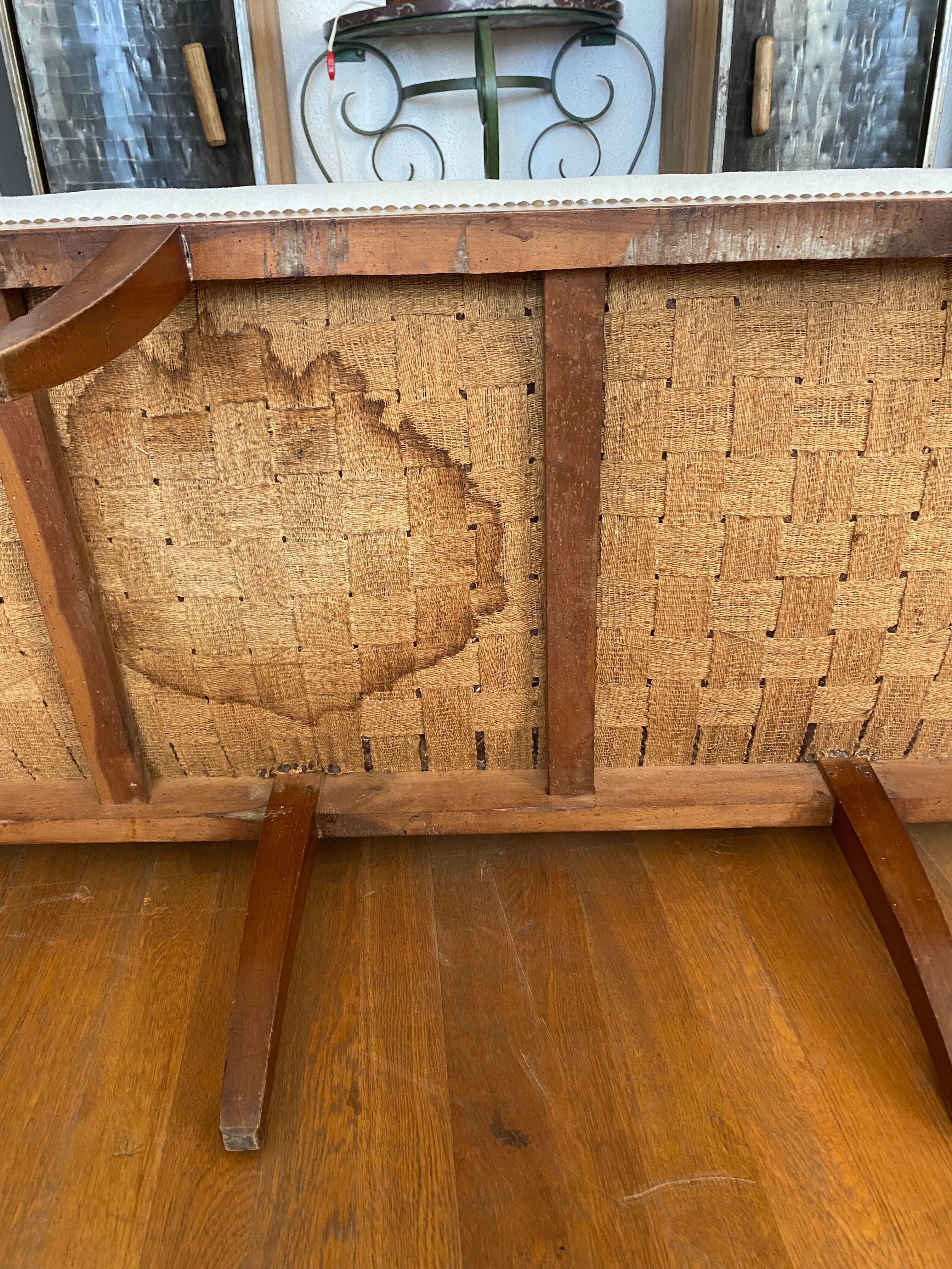 Walnut bench, from the restoration period, covered in white.