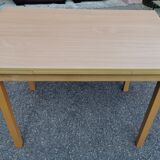 Beech table with extension cords
