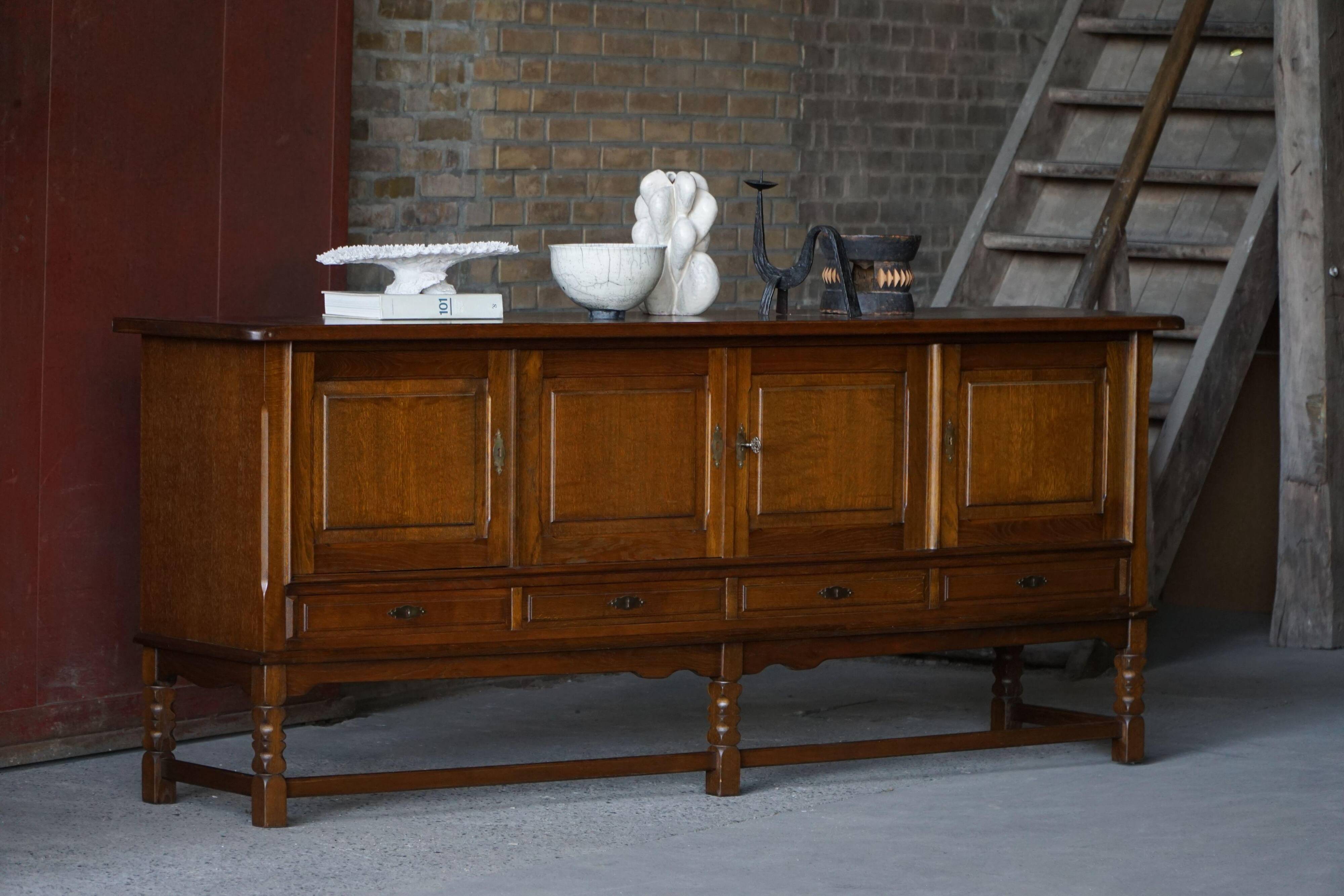 Danish enfilade from the mid-modern century in dark stained oak, 1960s.