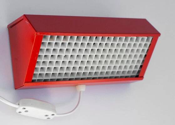 Orange Elidus bedside lamp in metal, designed by Hans-Agne Jakobsson in the 1970s.