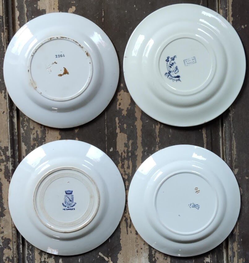 Set of four flat plates in iron earth