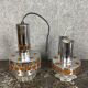 Two vintage space age pendant lamps by Raak, 1970