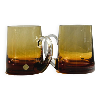 2 cups, amber glasses with modern blown glass design.