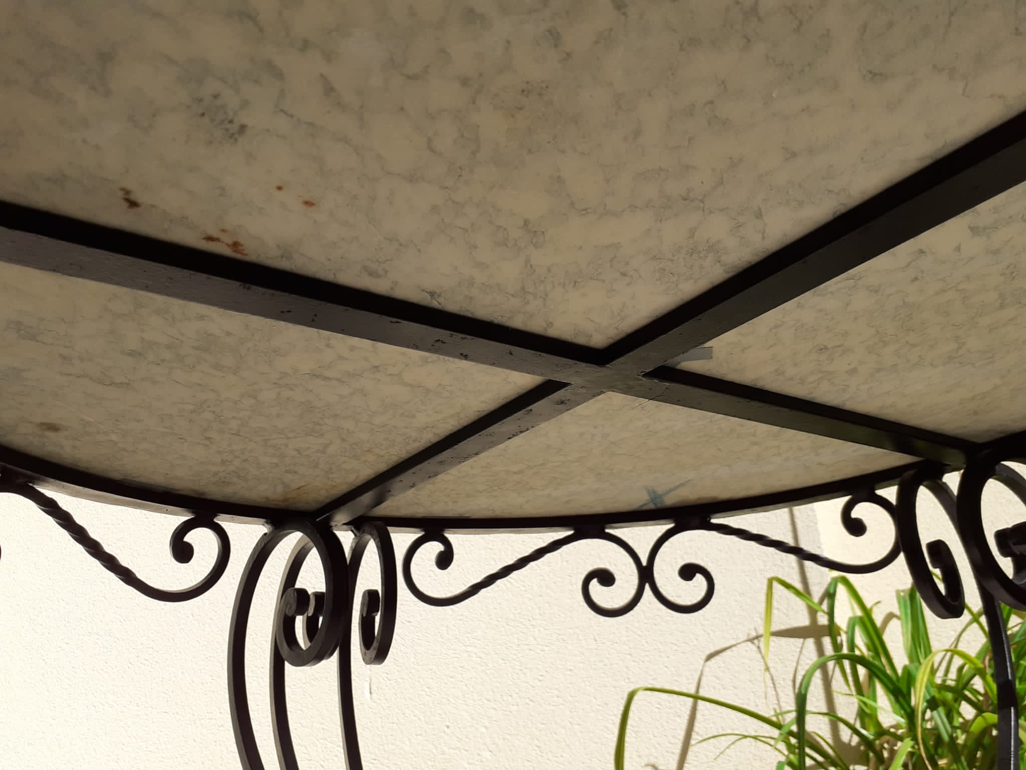 Marble and wrought iron coffee table
